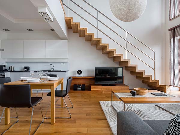 Two-floor apartment with wooden elements